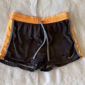 NIKE RUNNING SHORTS, WOMANS MEDIUM.  MESH MATERIAL.